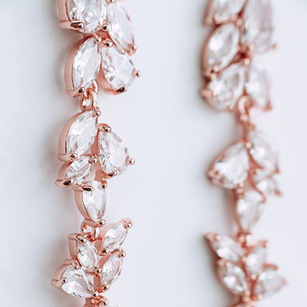 Cubic zirconia rose gold drop earrings closeup product photo