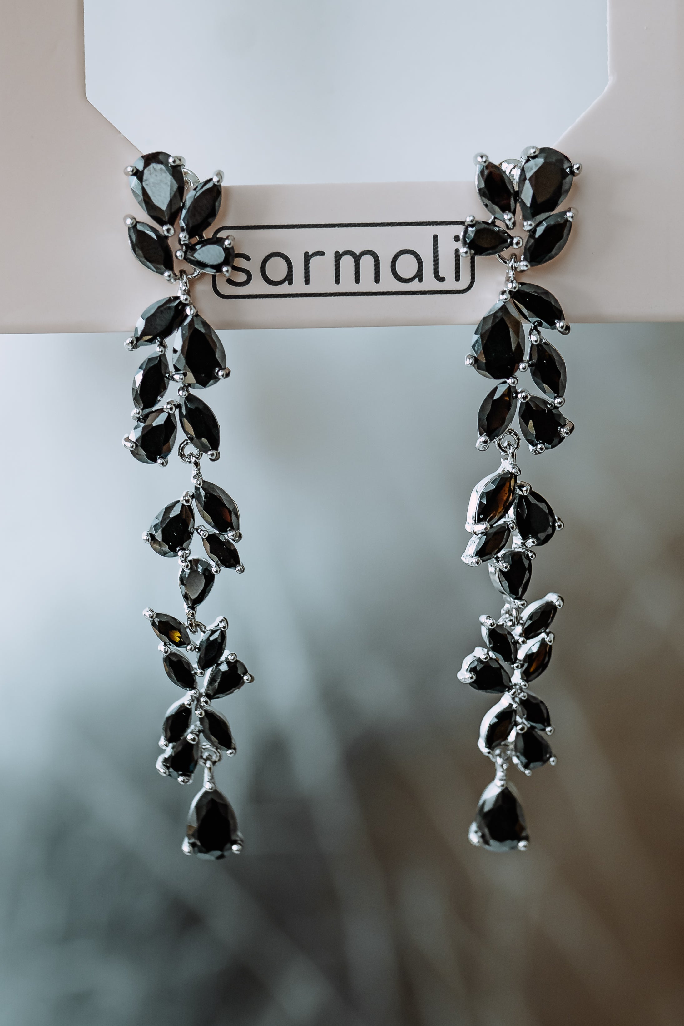 Cubic zirconia vine marquise drop earrings black silver - detailed close-up of CZ stones