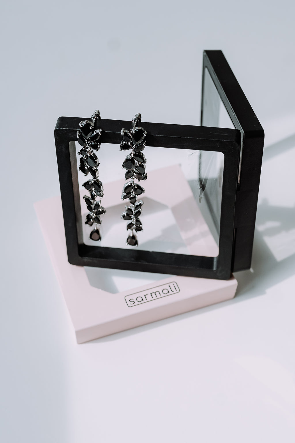 Cubic zirconia vine marquise drop earrings black silver - side profile showing drop length