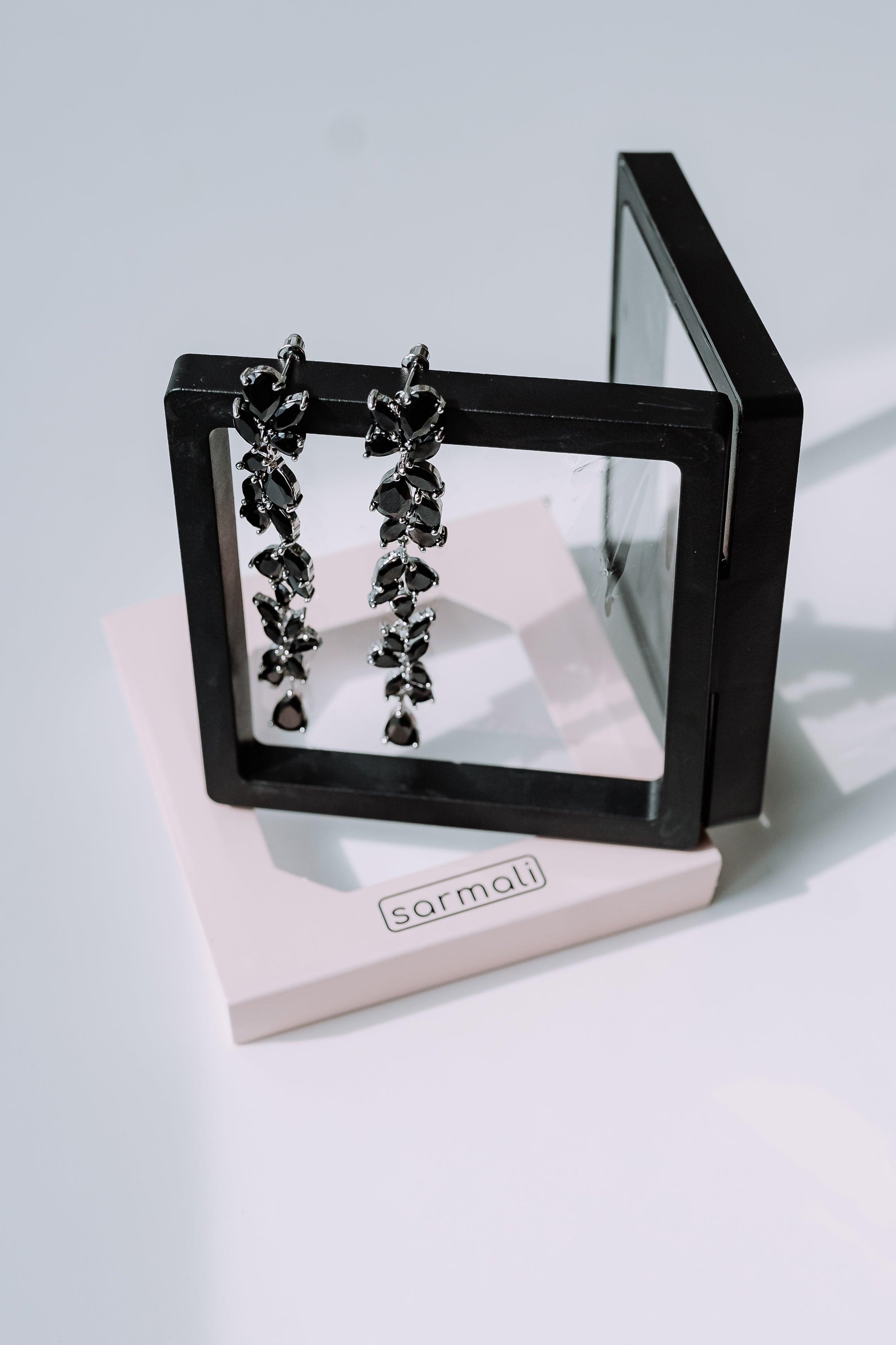 Cubic zirconia vine marquise drop earrings black silver - side profile showing drop length