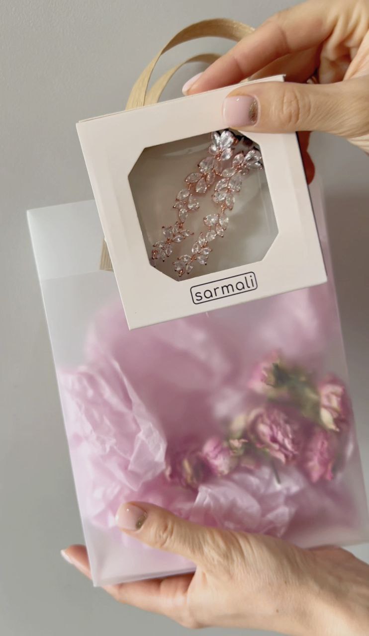 Rose gold cubic zirconia bridal earrings in elegant packaging