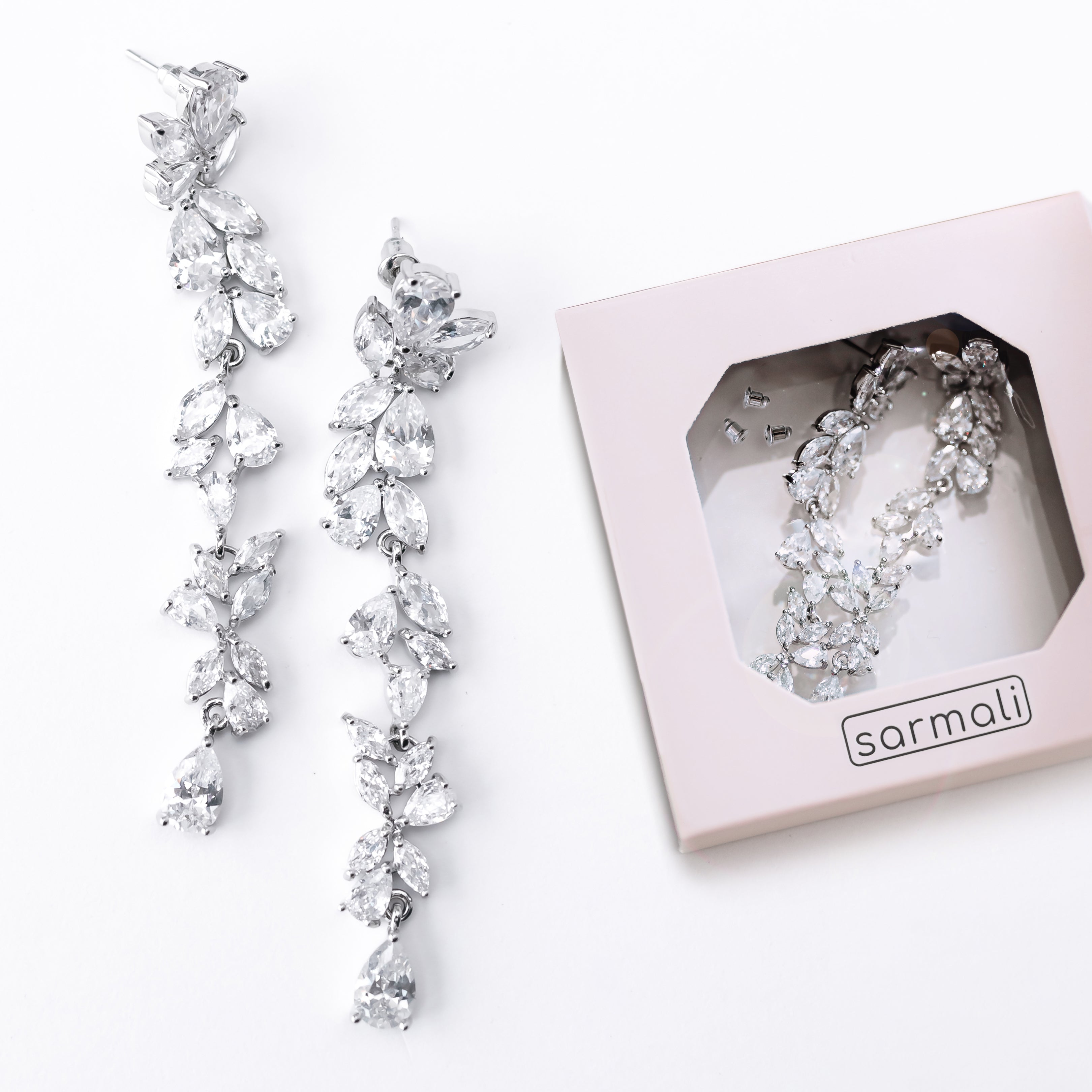 Sarmali white silver CZ drop earrings close-up detail