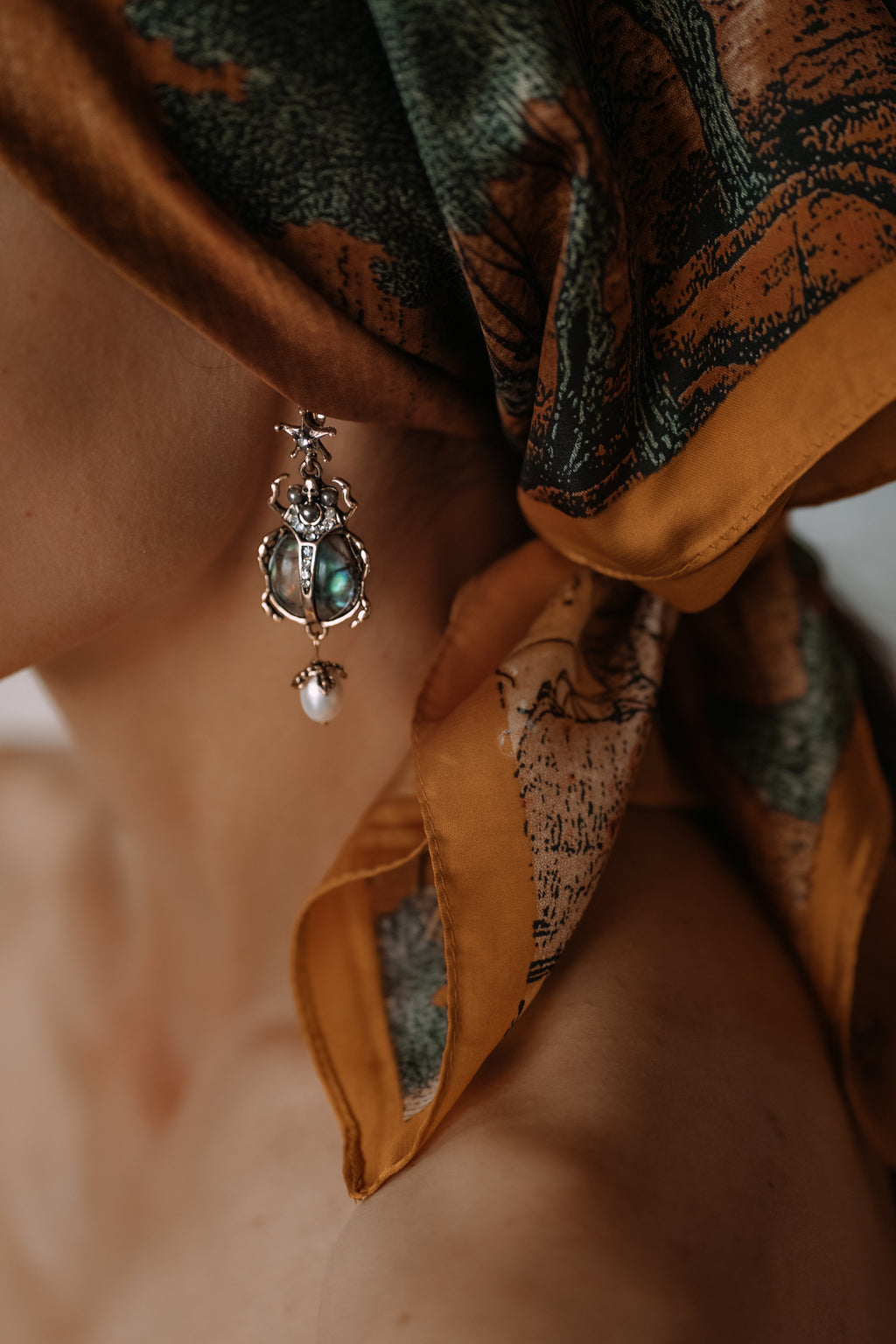 Vintage scarab beetle drop earrings abalone shell pearl - close-up of abalone shell detail